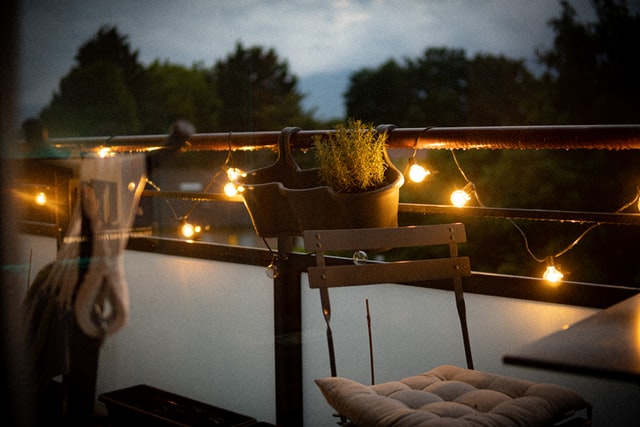 How to hang string lights on balcony ceiling