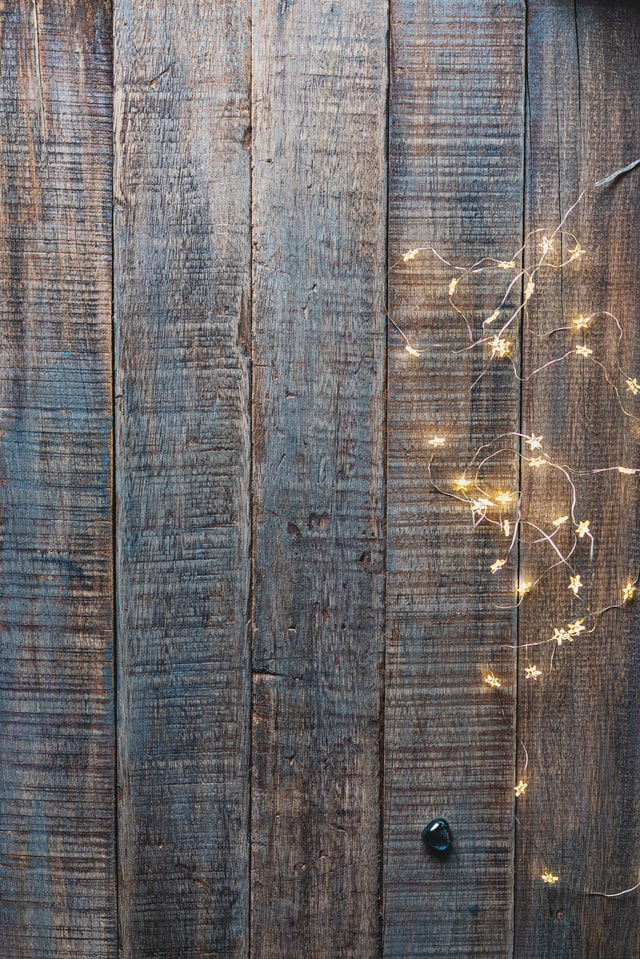 How to hang string lights on fence